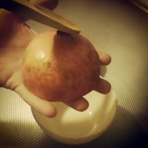 Gepofte knoflooksoep granaatappel